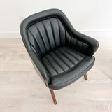 Pair of Black Naugahyde Mid Century Lounge Chairs