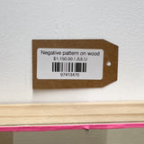 Negative pattern on wood
