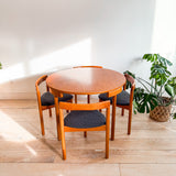 Hans Olsen Teak Roundette Dining Table + Chairs