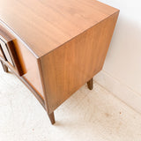 Pair of Mid Century Burlwood and Walnut Sculpted Bow Front Nightstands