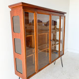 Mid Century Sculpted Curio with Glass Sides and Shelves