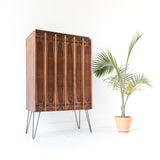 Mid Century Sculpted Armoire