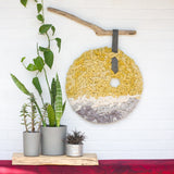 Round Woven Wall Hanging in Yellow + Grey on Driftwood