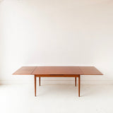 Mid Century Modern Danish Teak Expandable Dining Table by Arne Hovmand Olsen