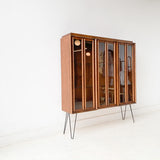 Mid Century Modern Sculpted Front Curio Cabinet with Glass Shelves