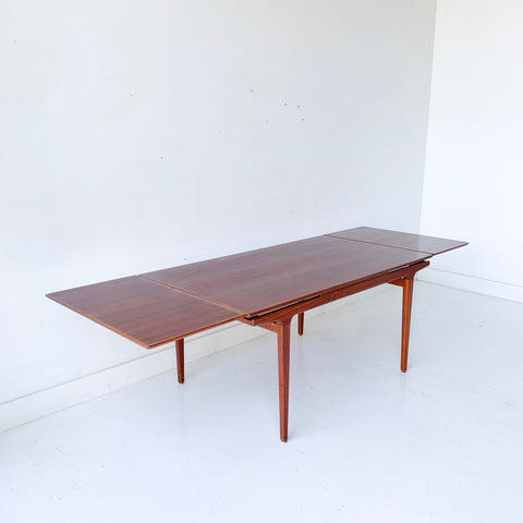 Danish Teak Expandable Dining Table by Johannes Andersen for Uldum Mobelfabrik