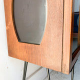 Mid Century Curio with Sculpted Sides